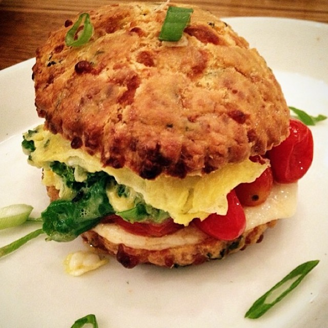 Cheddar Chive Biscuit, Eggs, Tomatoes, Cheddar, Kale at Cafe Madeline on #foodmento http://foodmento.com/place/3724