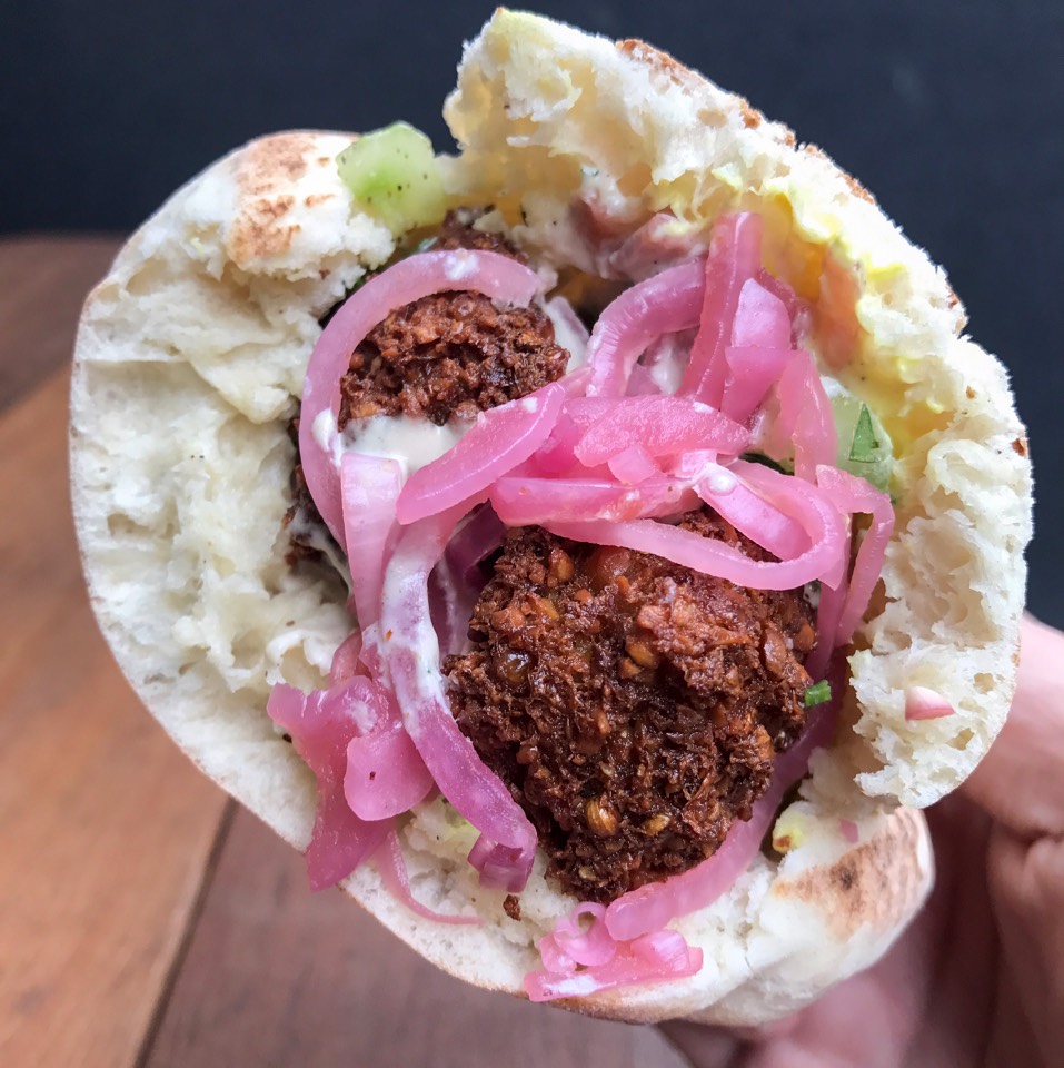 Falafel Sandwich with preserved lemon yogurt, spicy pickled onions and fresh mint (Jan special) at Taïm Falafel and Smoothie Bar on #foodmento http://foodmento.com/place/3251