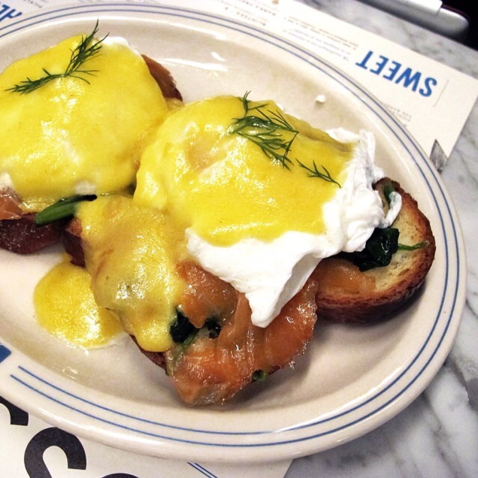 Eggs Benedict (Poached Eggs, Scottish Smoked Salmon, Sauteed Spinach, Hollandaise, Challah) at Russ & Daughters Café on #foodmento http://foodmento.com/place/3060