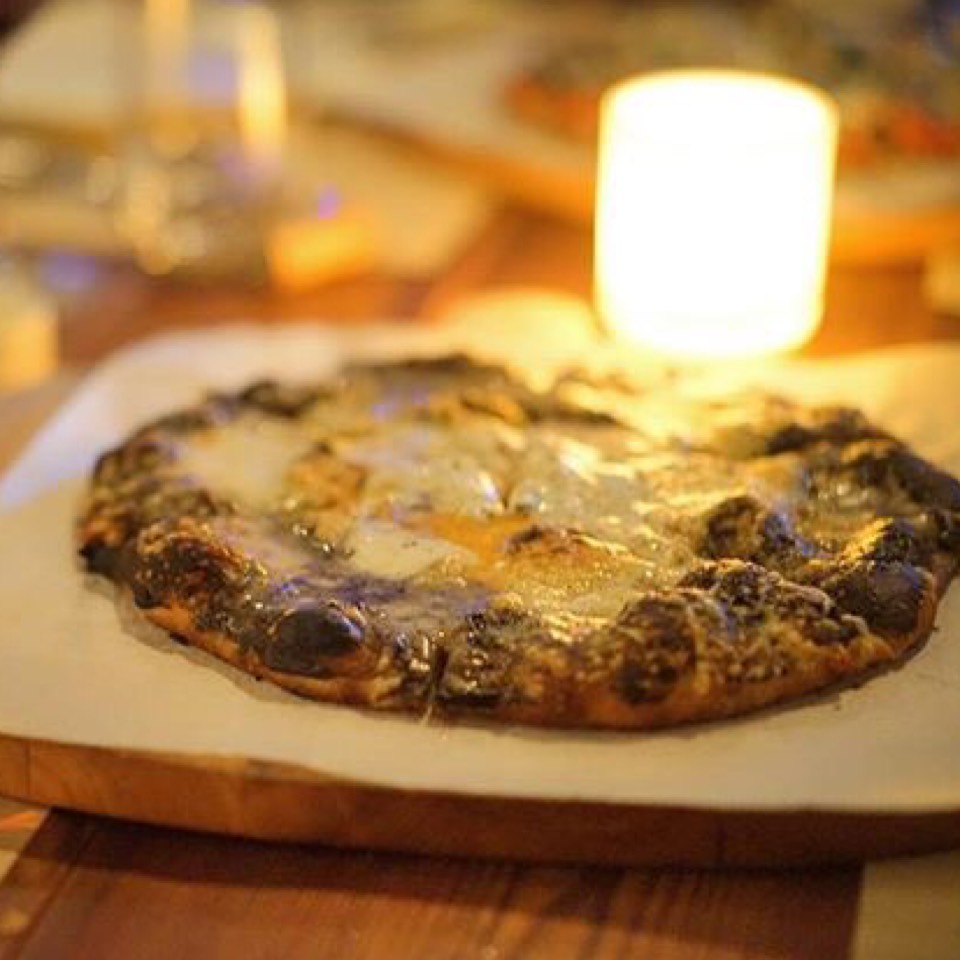 Pizza with black truffle three cheese + farm egg at Mercato on #foodmento http://foodmento.com/place/1562