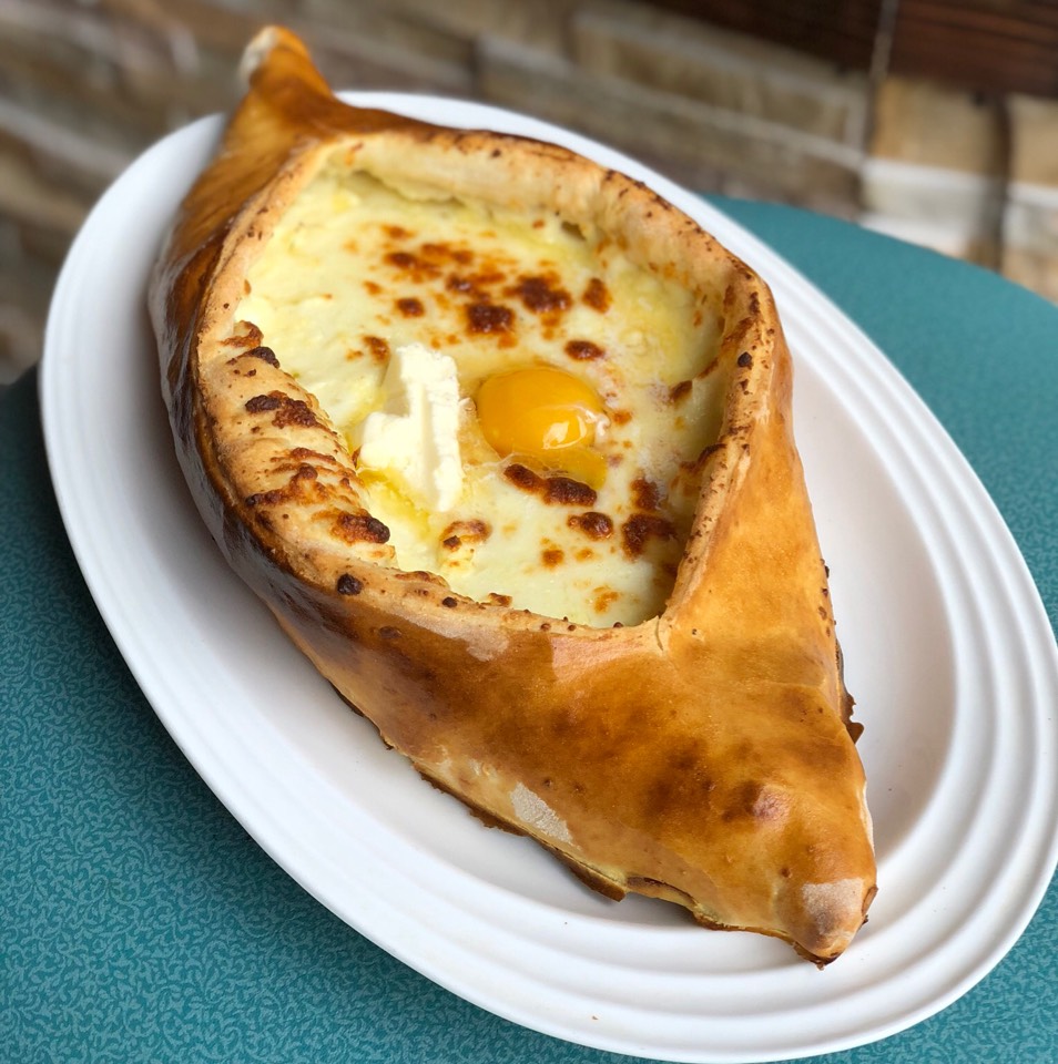 Khatchapuri Acharuli (Baked Bread With Cheese) at Georgian Dream Cafe and Bakery on #foodmento http://foodmento.com/place/11529