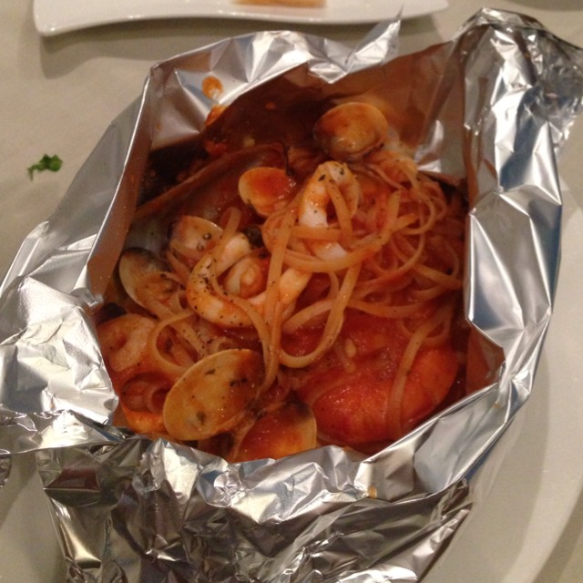 Linguine Al Cartoccio (Mixed Seafood In Tomato Wrapped In Foil) from Trattoria Bonissima on #foodmento http://foodmento.com/dish/4548