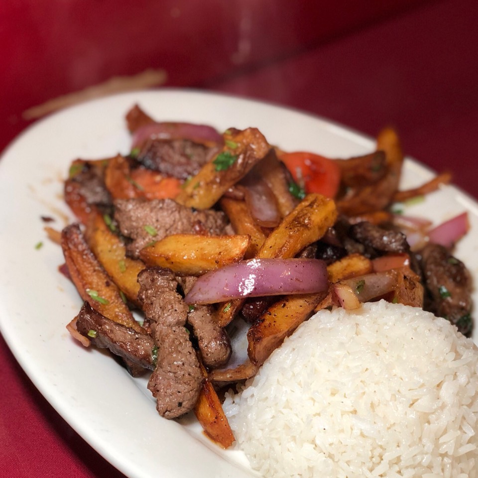 Lomo Saltado (Sauteed Strips of Beef, Onion, Tomato, Fries) at Mario's Peruvian & Seafood Restaurant on #foodmento http://foodmento.com/place/11988
