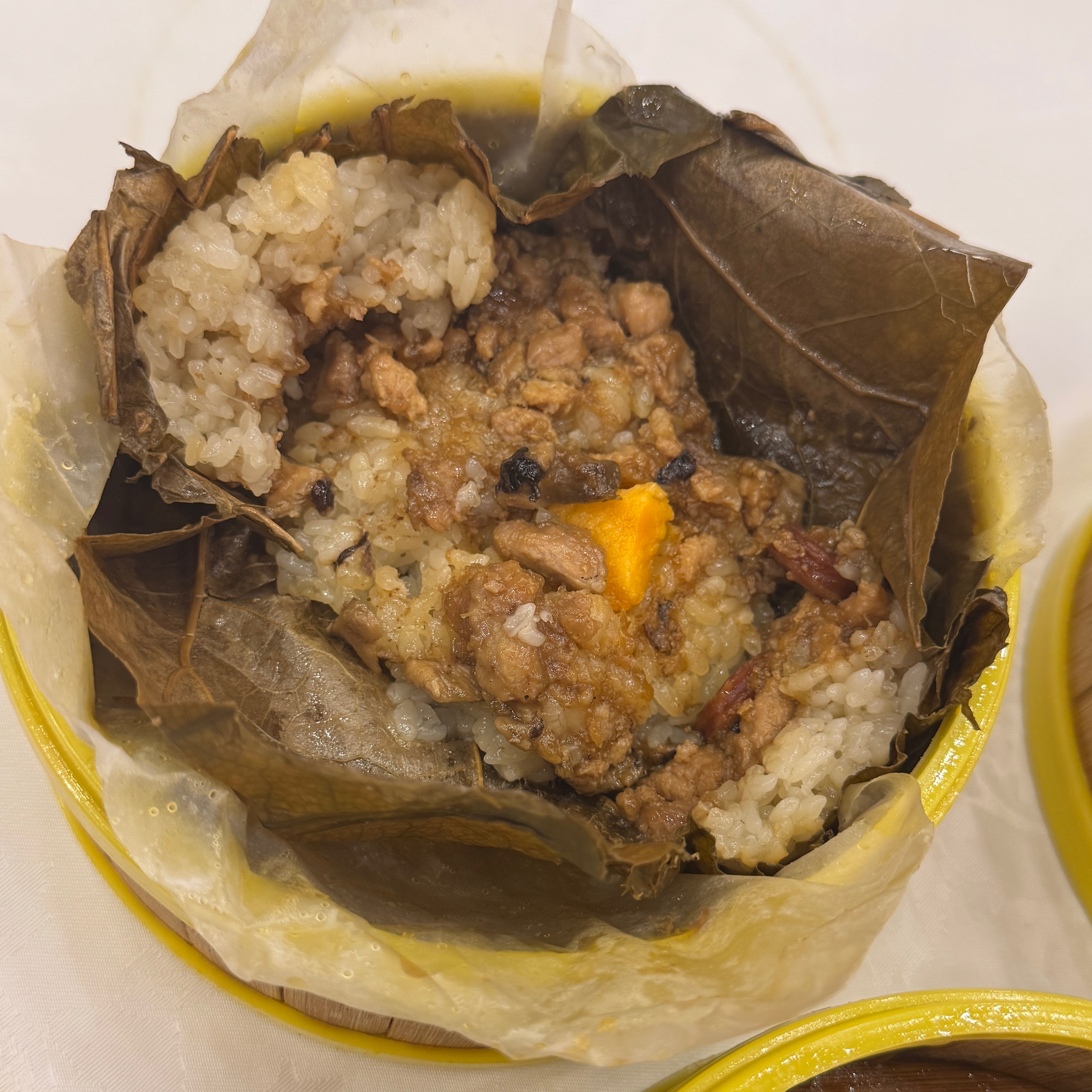 Whole Abalone Sticky Rice Wrapped In Lotus Leaf $6 on #foodmento http://foodmento.com/dish/51353
