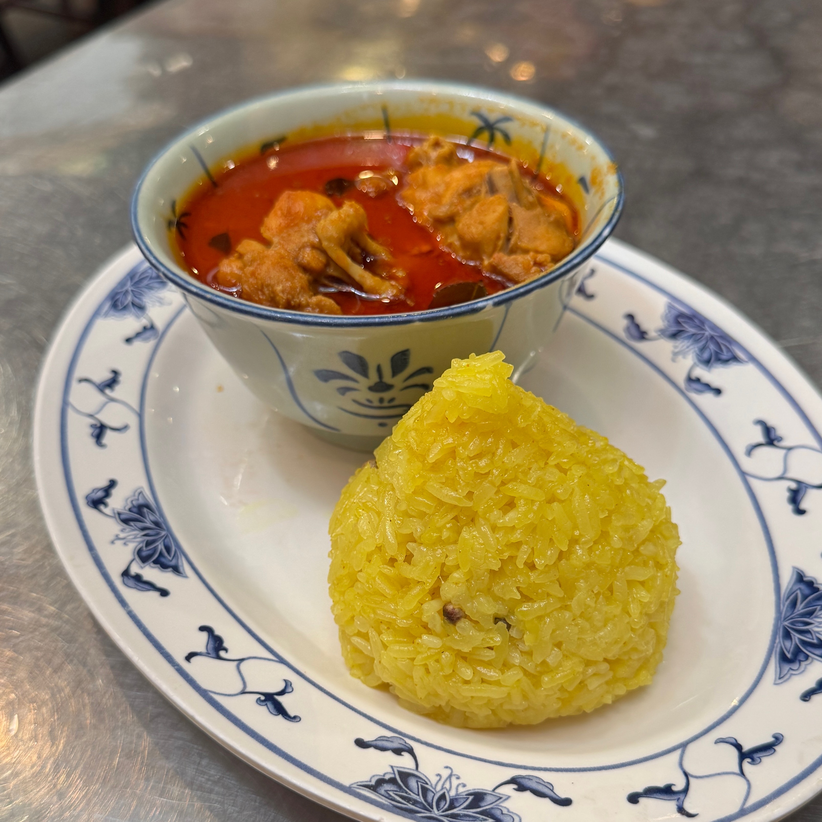Nasi Kunyit (Curry Chicken) $12 at Moh Teng Pheow Nyonya Koay on #foodmento http://foodmento.com/place/15351