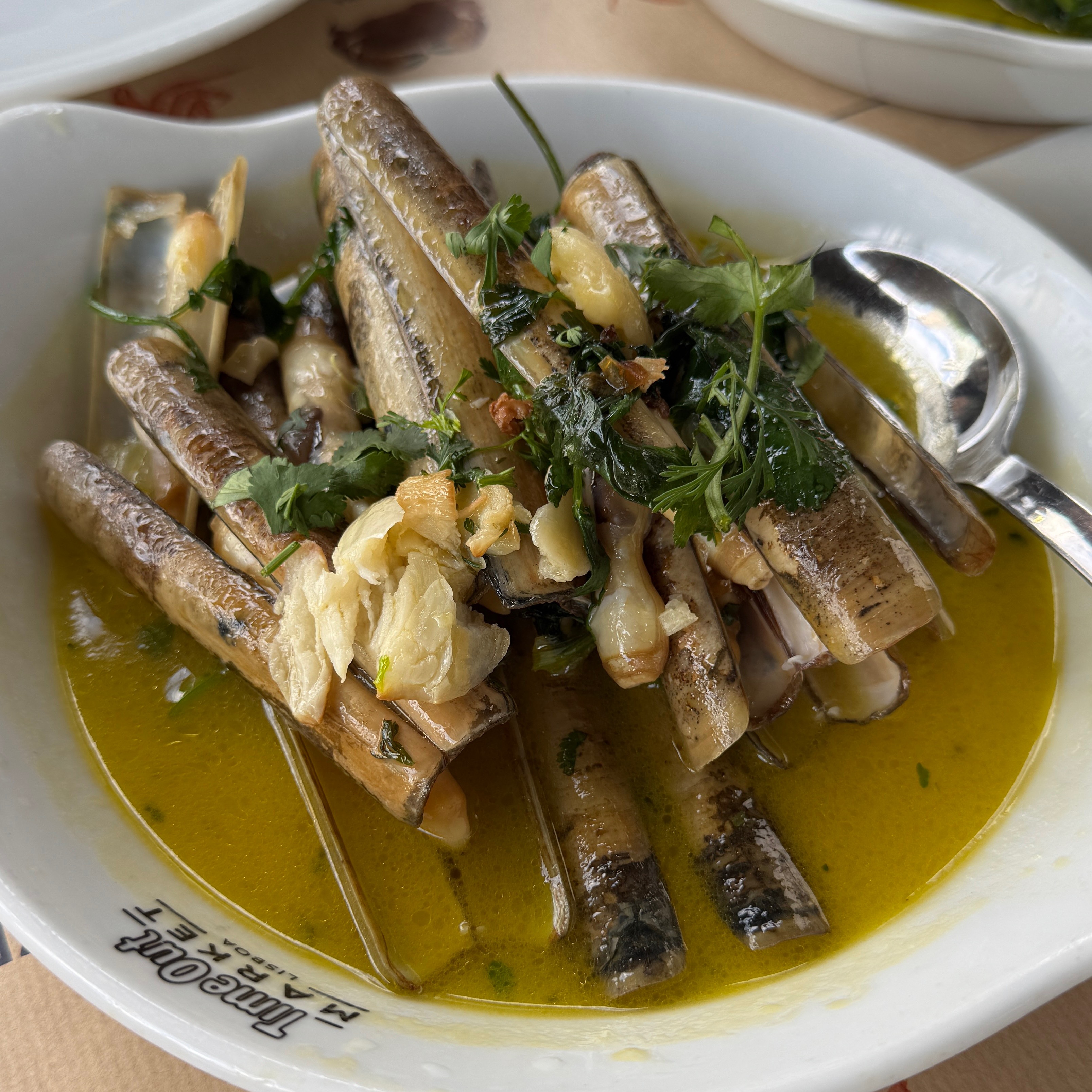 Portuguese style Razor Clams $18.50 at Marisqueira Azul - Time Out Market on #foodmento http://foodmento.com/place/15532