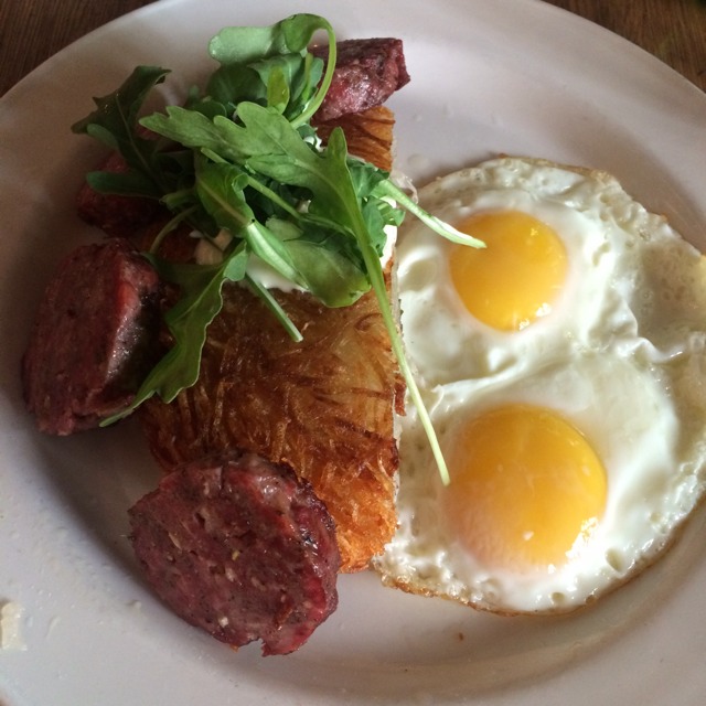 Saucisson A L'ail Pork And Garlic Sausage, Fried Eggs, Hash Brown, Creme Fraiche And Arugula from Joseph Leonard on #foodmento http://foodmento.com/dish/12972
