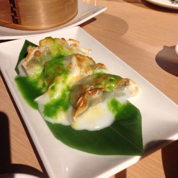 Pan-fried Seafood Gyoza in White Wine Cream Cheese Sauce at MAD (Modern Asian Diner) by TungLok on #foodmento http://foodmento.com/place/492