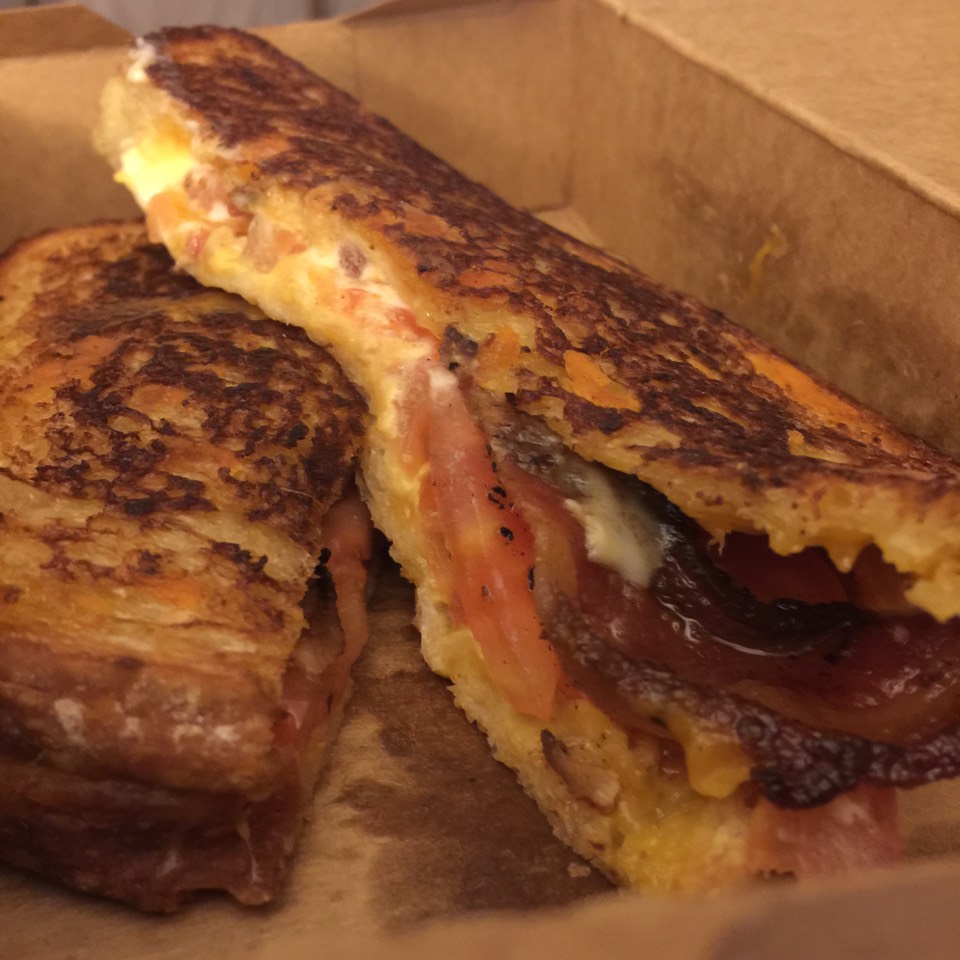 Wisco Grilled Cheese Sandwich (Aged Cheddar, Bacon, Tomatoes) at Melt Shop on #foodmento http://foodmento.com/place/4952